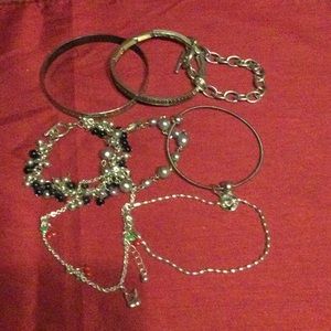 7 Silvertone Bracelets